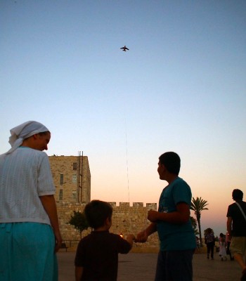 A child flies a kite in Jerusalem 