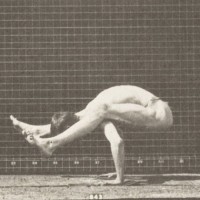 Man_in_pelvis_cloth_performing_contortions_(rbm-QP301M8-1887-510a~9)