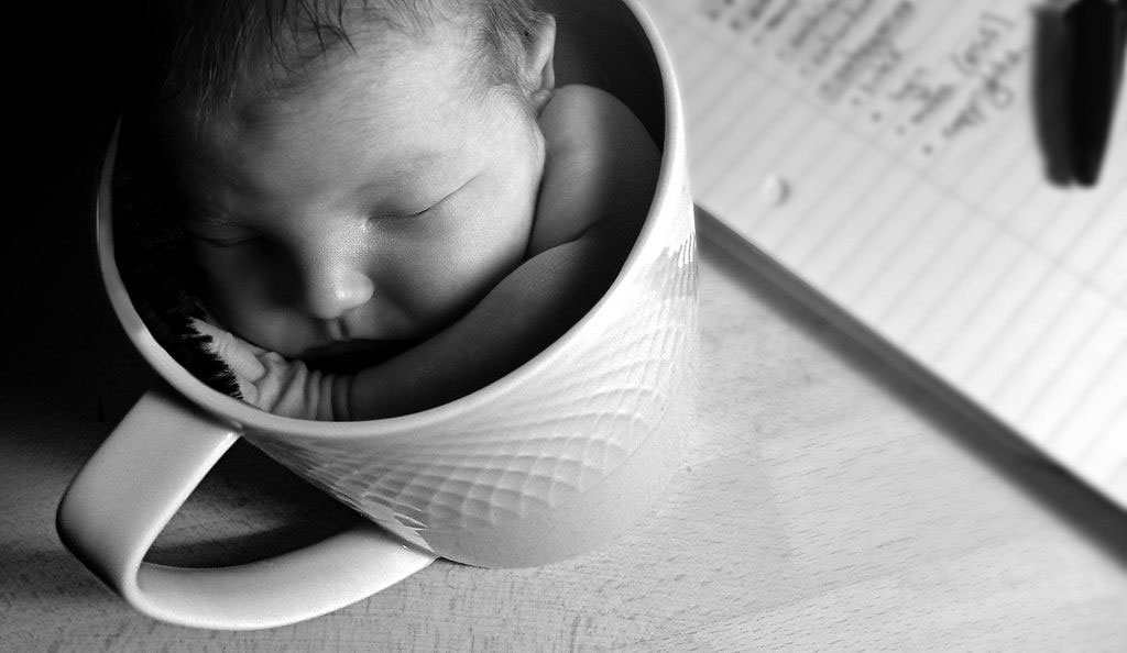 baby in a mug