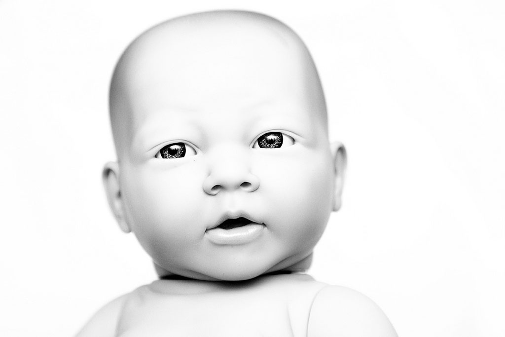 Black and white baby doll head