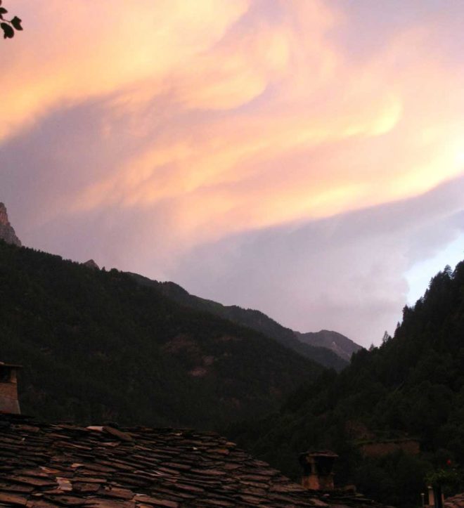 In the Alps, near Torino, Italy. Mountains beneath a cloudy sky