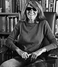 Joy Williams in front of a bookshelf