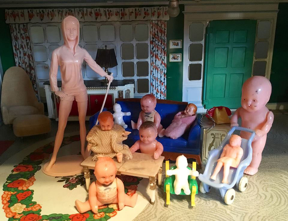 write a creative craft essay observe the different plastic toy family arranged in dollhouse