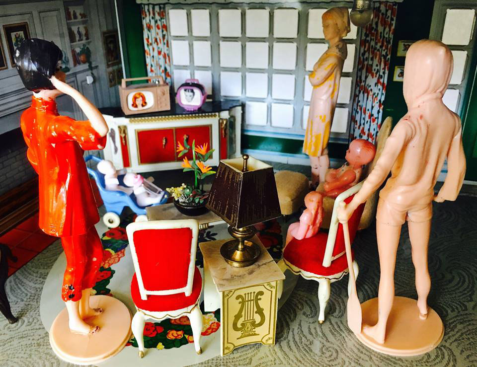 write a creative craft essay observe the different plastic toy family in dollhouse living room