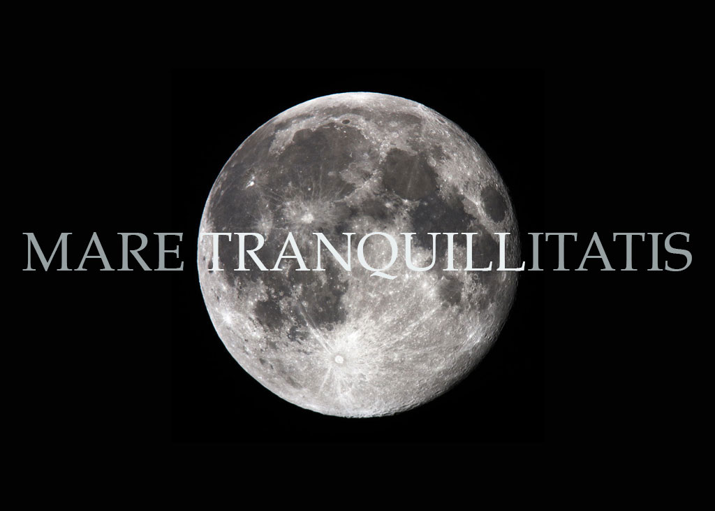 Black-and-white moon with the title of the piece in the center