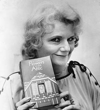 Author Photo of V. C. Andrews holding book Flowers in the Attic