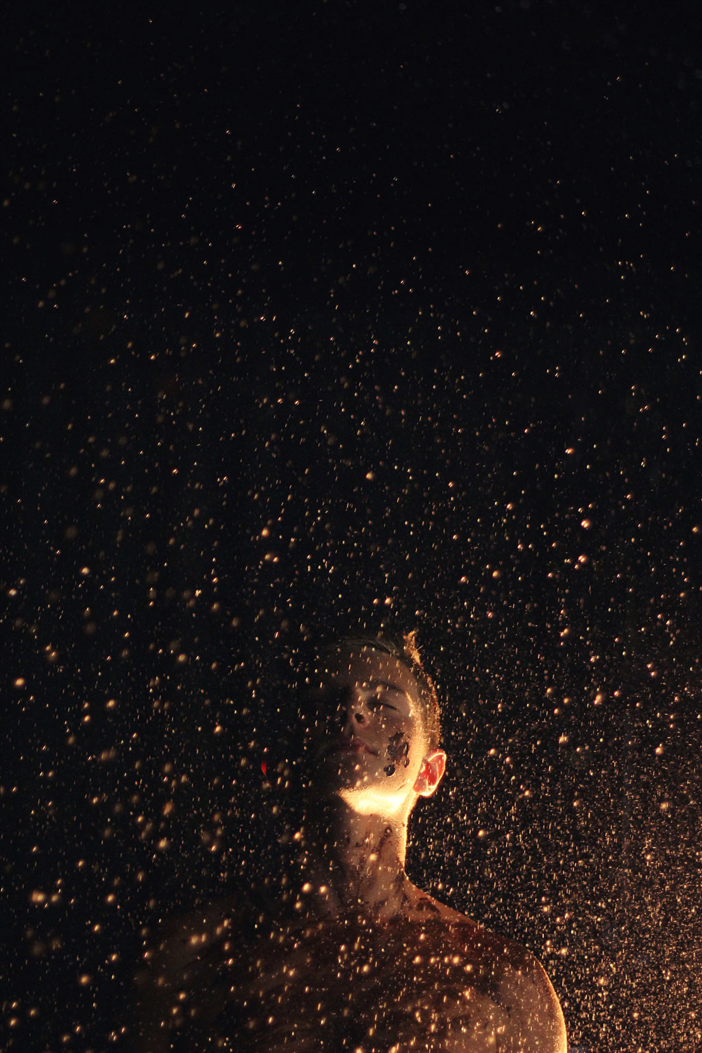 Night sky with fireflies and woman's head