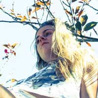 Photograph of Anna Dorn under a tree