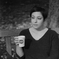 Rae Pagliarulo holding a cup of coffee