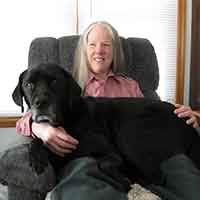 Donna W. Will author photo with guide dog