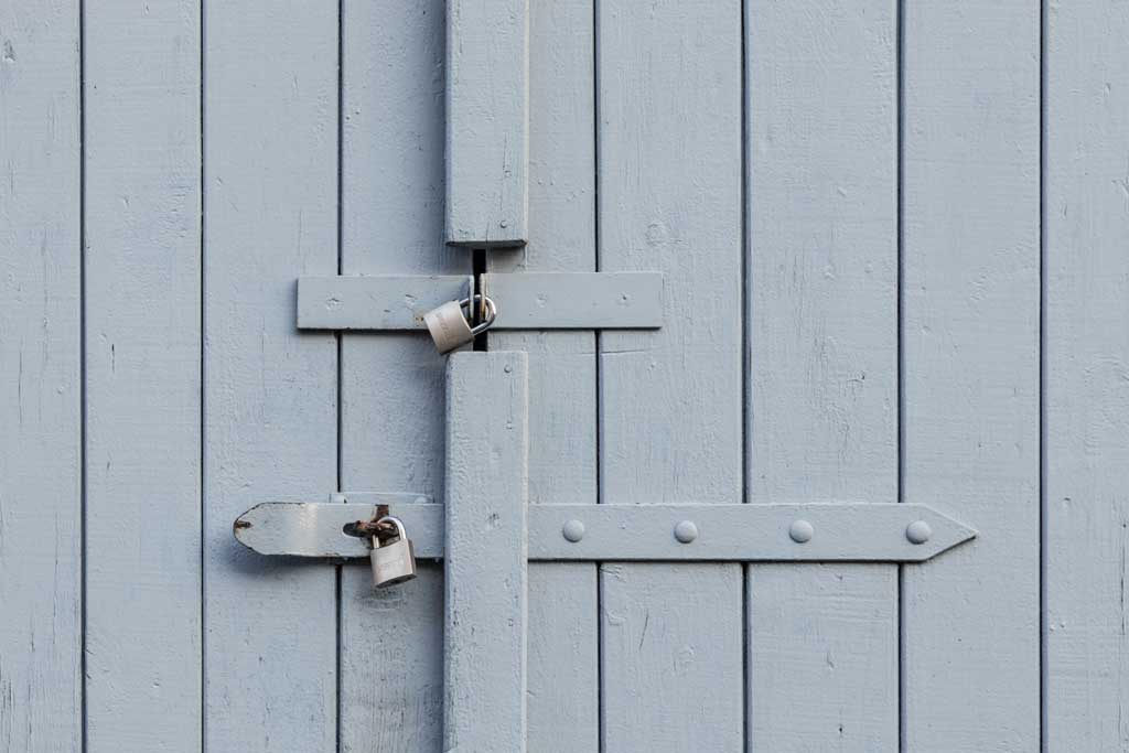 Blue gate with two locks