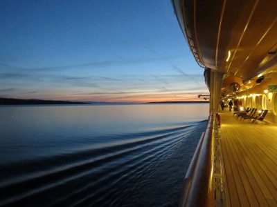 View from the deck of an ocean liner at sunset